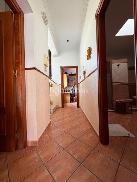 Foto 26f89a7a-ffd8-4db0-8fd7-aaddc7679c52. Casa aparellada a Isla Cristina
