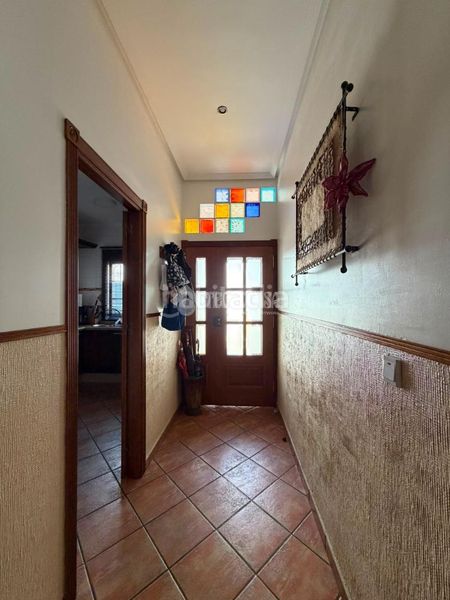 Foto 512b3f12-ee08-424b-9758-3c4b5b2e0e44. Casa aparellada a Isla Cristina
