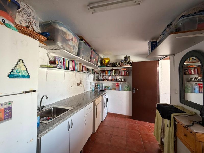 Foto 7fc4af8c-84f9-4199-9184-873ad894aa36. Casa aparellada a Isla Cristina