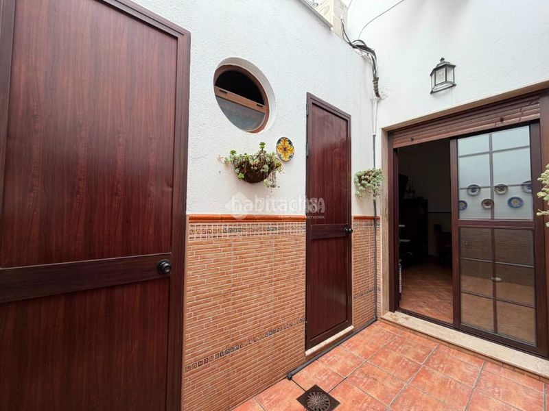 Foto f260b94d-68bd-42f6-a2de-87af0f1e1ee6. Casa aparellada a Isla Cristina