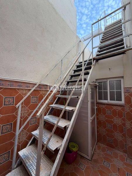 Foto 438443e2-7a04-47a9-95d2-7a58d0d0f55e. Casa aparellada a Isla Cristina