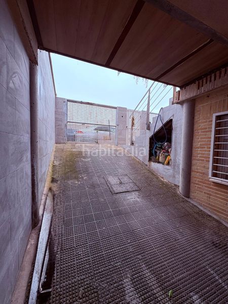 Foto 57bcb462-3214-4ec5-b39e-e8ba8a794c15. Casa adossada amb aparcament a Yuncos