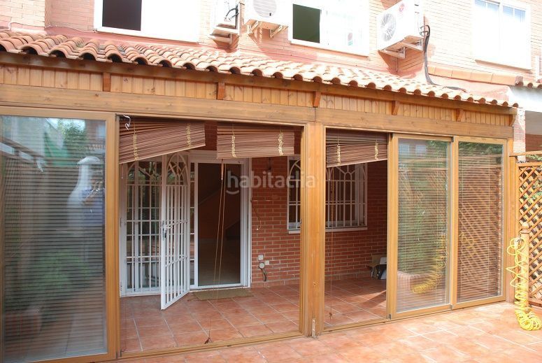 Foto 1a42b615-1fe0-45e7-9e4f-f26a58f98df6. Casa adossada amb calefacció piscina a Loranca Fuenlabrada