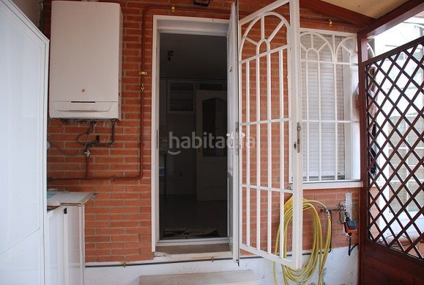 Foto 97b60701-fba0-41cc-8d4b-e1b9d5b1216c. Casa adossada amb calefacció piscina a Loranca Fuenlabrada