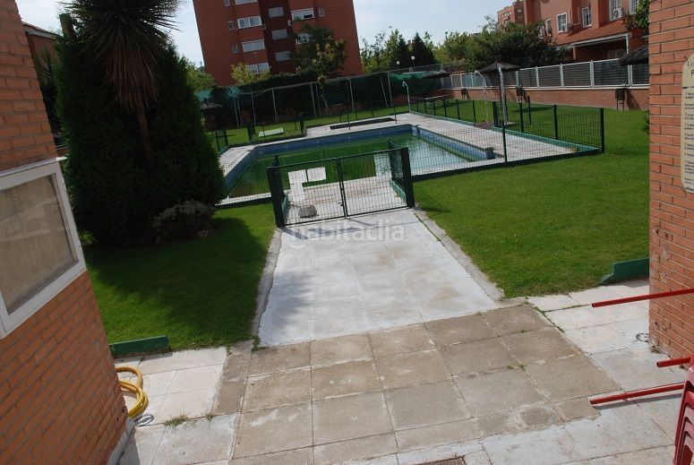 Foto b2a75655-23af-499c-83ec-bf394867fbf5. Casa adossada amb calefacció piscina a Loranca Fuenlabrada