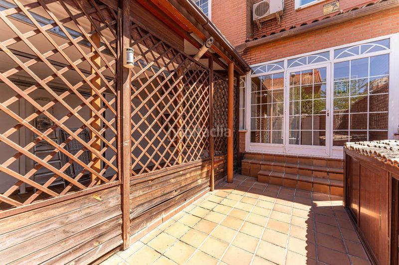 Foto 04efe9b1-5740-4129-9687-1b6fec65c3f7. Casa adossada amb calefacció piscina a Loranca Fuenlabrada