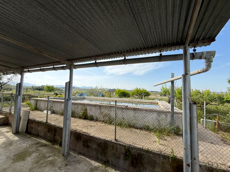 Foto 006c8897-1625-4c8e-9e15-358509d393f0. Masia amb xemeneia aparcament piscina a Albaida
