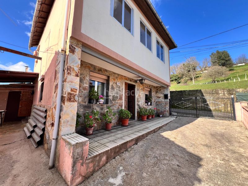 Foto 5a42c258-777b-4f63-bc04-f3b7baee603c. Casa amb calefacció aparcament a Lada Langreo