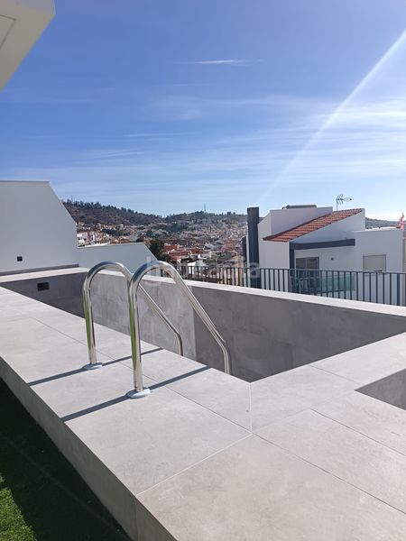 Foto 3b79fff8-2433-478e-8dd0-8b8acc3d8703. Casa aparellada amb calefacció aparcament piscina a Málaga