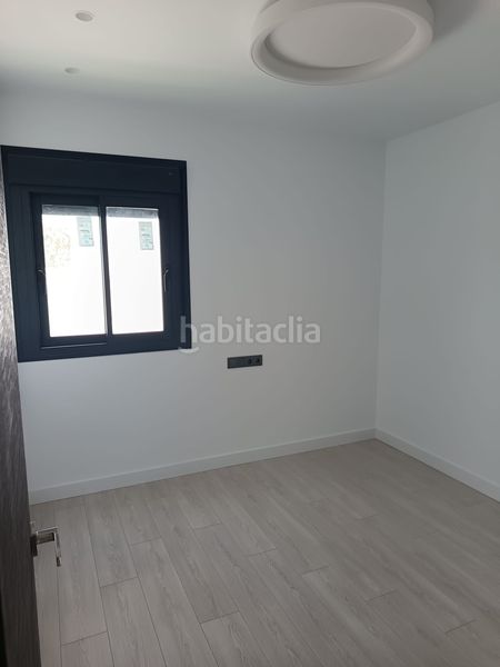 Foto 9db27cf3-ce2c-4afb-b3f3-15dd66677c88. Casa aparellada amb calefacció aparcament piscina a Málaga