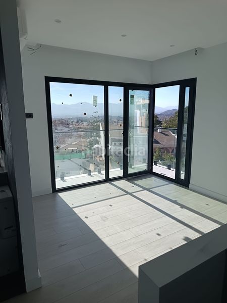 Foto c0c1af51-7718-413a-8de3-2509ec991fa7. Casa aparellada amb calefacció aparcament piscina a Málaga