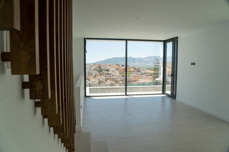 Foto c24699fa-0b7d-48fd-9699-2a3a6093620b. Casa aparellada amb calefacció aparcament piscina a Málaga