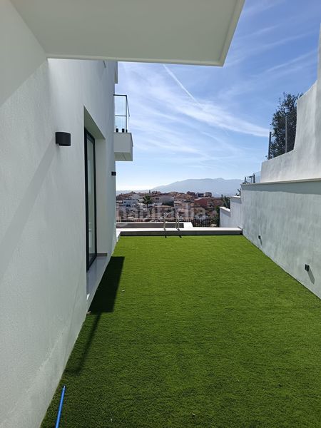 Foto c461ea09-6dda-4420-a7ca-d057d765132a. Casa aparellada amb calefacció aparcament piscina a Málaga