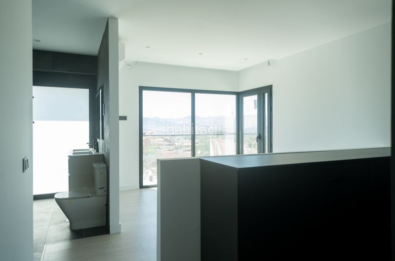 Foto ea28e6a8-d0fa-4d72-80f4-248738084e8b. Casa aparellada amb calefacció aparcament piscina a Málaga