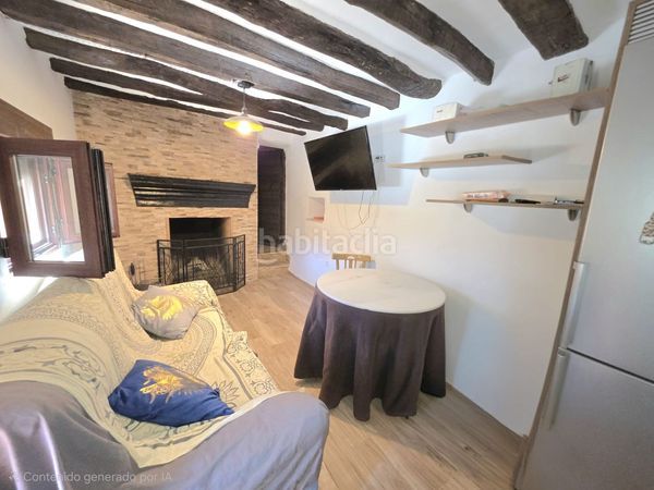 Foto 032ebf80-d800-42fe-bd34-a4cfe9452096. Casa adosada en Laroya