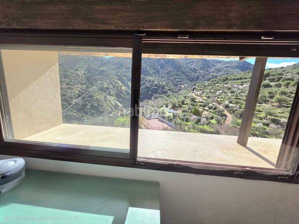 Foto 14939b3d-3330-40ee-ab02-742d7281cddb. Casa adosada en Laroya