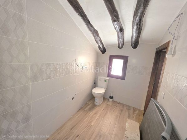 Foto 171dd300-8c2e-4f01-b859-b48dcfbfd2de. Casa adosada en Laroya