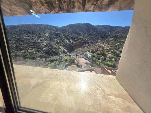 Foto 3297d6de-26a8-4cb4-ab8c-100465cf62ae. Casa adosada en Laroya