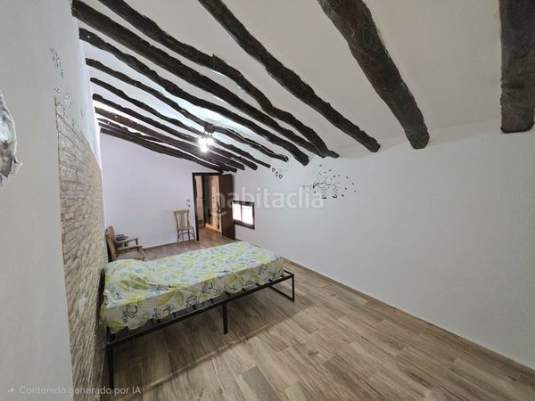 Foto 94848351-7d73-45b6-ac2b-2ddef64459df. Casa adosada en Laroya