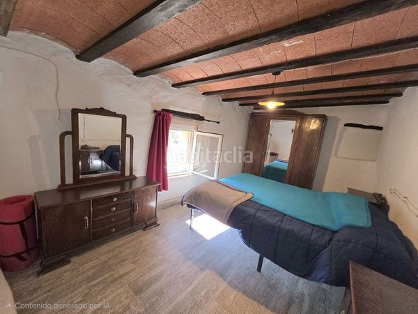 Foto e70cd701-314b-47db-b4bc-88d49416b428. Casa adosada en Laroya