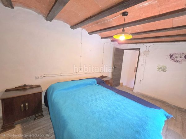 Foto d9bd7e9d-59fc-4adb-87b5-306091d4857f. Casa adossada amb xemeneia a Laroya