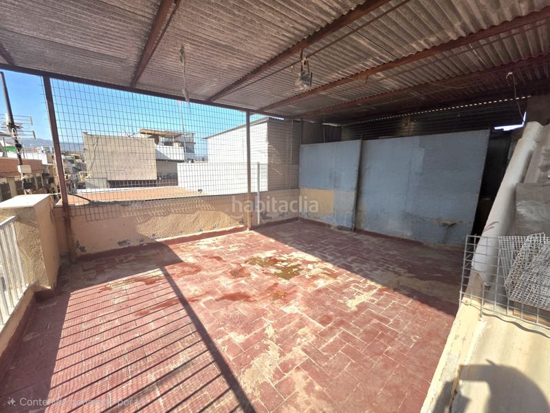 Foto b908f874-636f-4e7e-b482-59e8ae3c342a. Casa adossada a Casco Antiguo Águilas