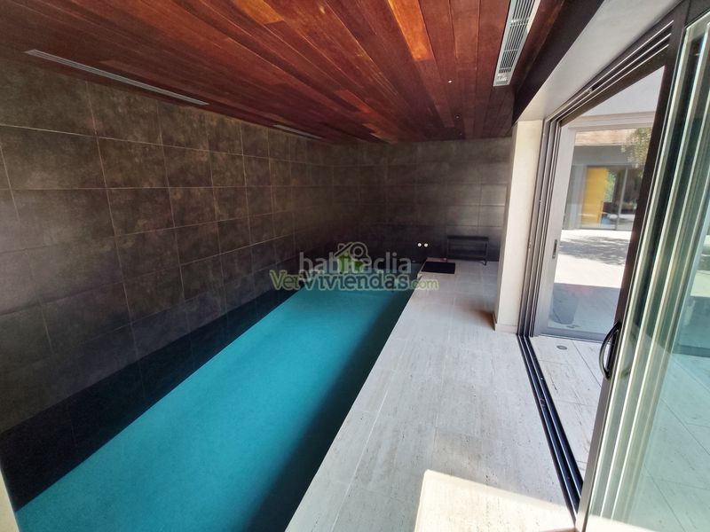 Foto ef2c1df7-3010-49e1-af9f-8ad740c32f00. Casa amb xemeneia calefacció aparcament piscina a Sant Cugat del Vallès