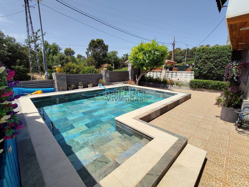 Foto e385a180-f16e-43a5-a3ae-bb88d170404e. Casa adossada amb calefacció aparcament piscina a Abrera