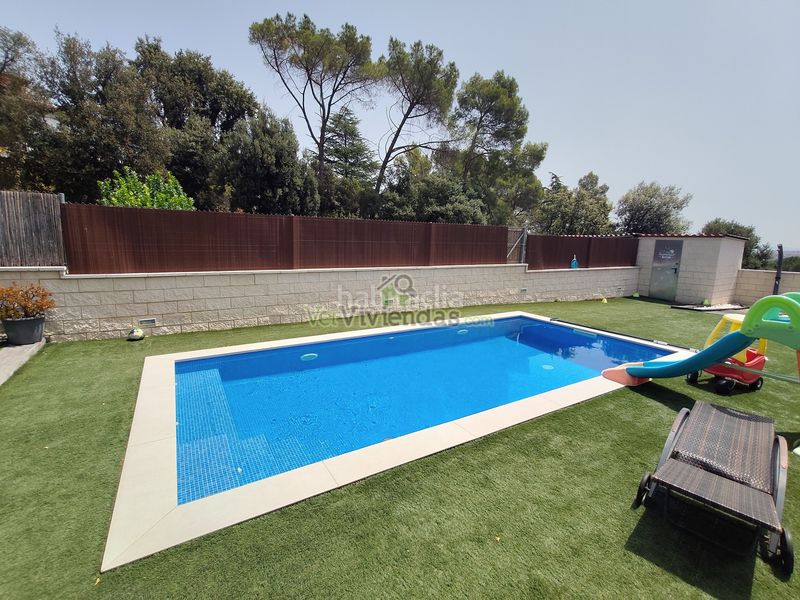 Foto edb3f9a9-ead5-4d3e-8c03-57ab53acc7aa. Casa adossada amb xemeneia calefacció aparcament piscina a Castellar del Vallès