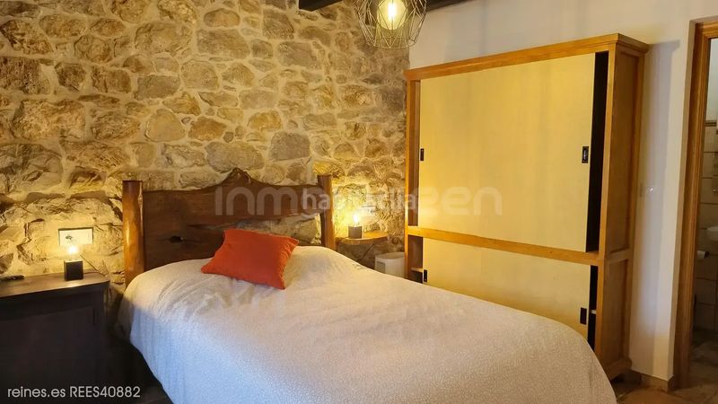 Foto b1bfbb4d-a9fe-4e19-be1d-0acf27008c48. Chalet avec chauffage dans Onís
