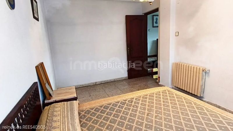 Foto 1b83d86d-1f99-4c31-8d0f-9e71d459896e. Casa aparellada amb calefacció a Miengo pueblo Miengo