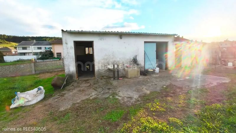 Foto 5fa87f90-51ca-4935-9623-7ba047b143a8. Casa aparellada amb calefacció a Miengo pueblo Miengo