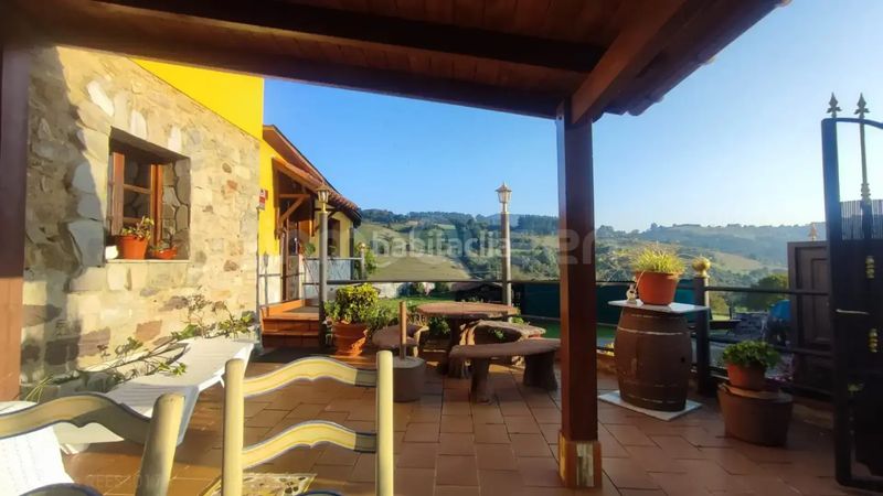 Foto f1fb4323-45bd-451c-8ff4-33b722b0e36d. Casa aparellada amb calefacció a Candamo