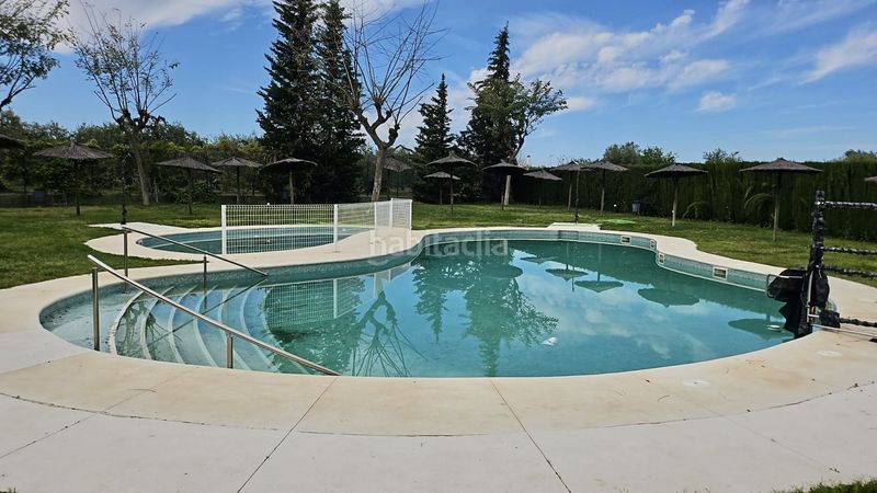 Foto 25ffa5fa-934d-4a79-9a84-19b82ba968ac. Casa adossada amb aparcament piscina a Benacazón