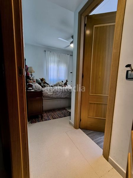 Foto db7b7074-831c-4ba5-bee5-f1ecc68739ef. Casa adossada amb aparcament piscina a Benacazón