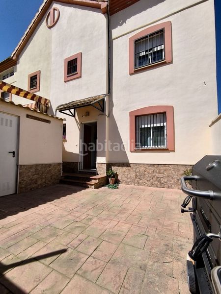 Foto e36710f5-fbee-4f82-b0c3-ba364cabceb0. Casa adossada amb aparcament piscina a Benacazón