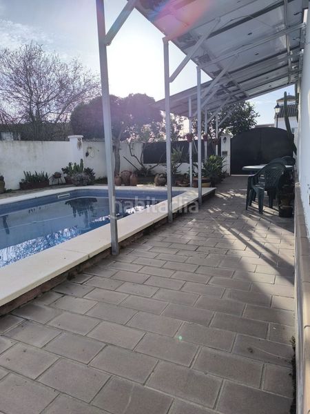 Foto e79169fb-7c98-4ad0-bfbc-83c7ca1a40e7. Casa a Sanlúcar la Mayor