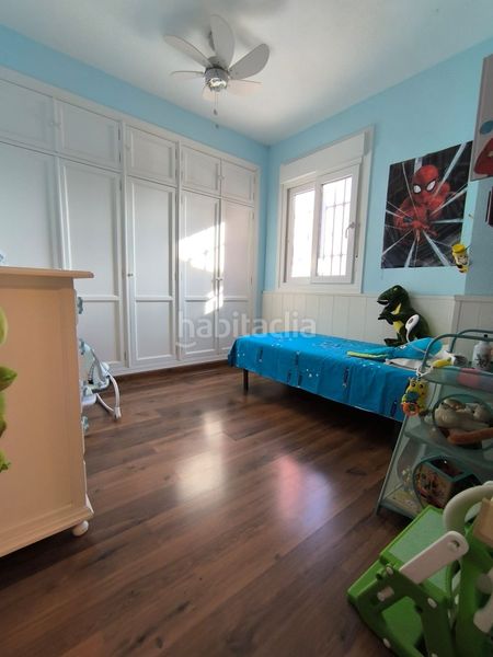 Foto 4a3f2616-e3f9-4ff5-80a7-5ffd9b8e96ac. Casa adossada amb aparcament a Umbrete