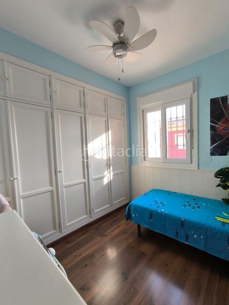 Foto c9dd97b1-c599-4a40-b328-8e2f4f881784. Casa adossada amb aparcament a Umbrete