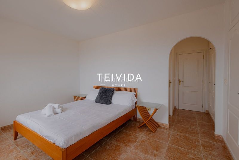 Foto fa47a05e-c686-4f26-b827-7e1d9d6a987b. Casa adossada amb aparcament piscina a Torviscas Centro y Alto Adeje