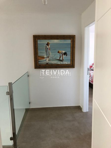 Foto 17ab674c-31ed-4147-aa10-6d1f9d259f0a. Casa adossada amb aparcament piscina a San Eugenio Bajo Adeje