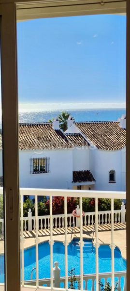Foto 94c55822-c599-45e1-9d14-956e4559b396. Casa adossada amb aparcament a Riviera del Sol Mijas