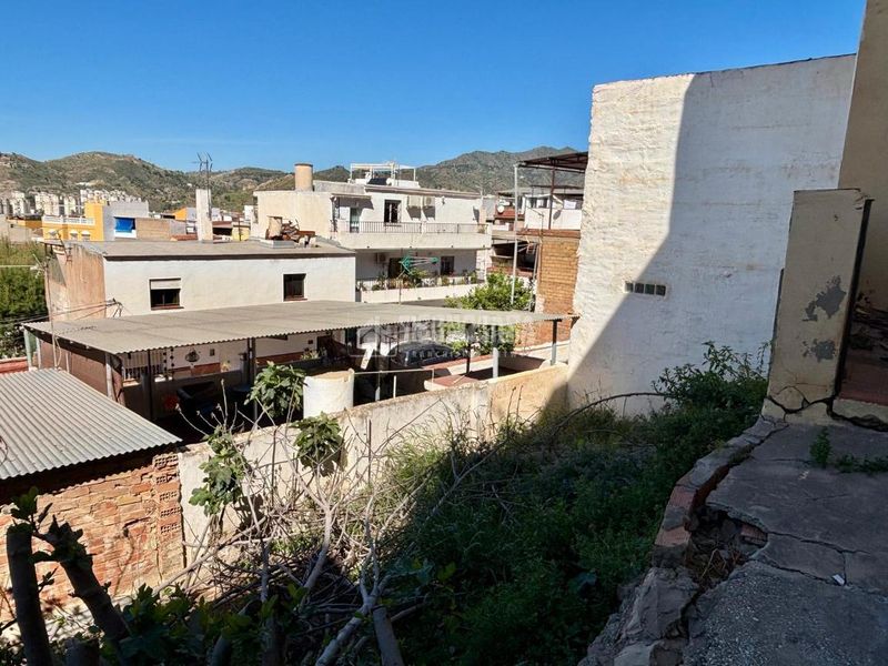 Foto ff9c7520-f42c-4c6d-8ae6-bbae2430a99e. Casa aparellada a Mangas Verdes - Las Flores - Parque del Sur Málaga