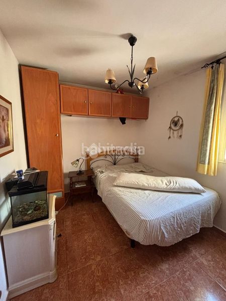 Foto 60ae7ff4-f590-4eb1-b20b-11a3fd9375f7. Casa aparellada a Andújar
