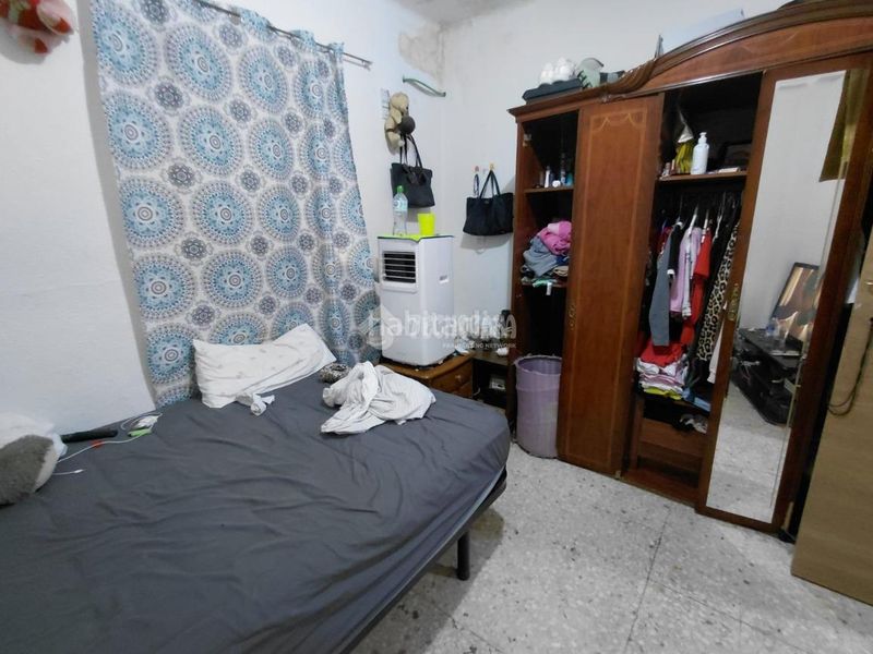 Foto 02f1ddf7-f70b-45f5-b7c7-1263cab82447. Casa aparellada a Palmete Sevilla