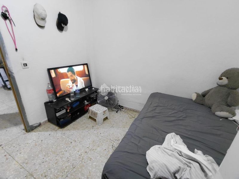 Foto 0f39927d-d56b-4bae-9d34-97d72ade1c33. Casa aparellada a Palmete Sevilla