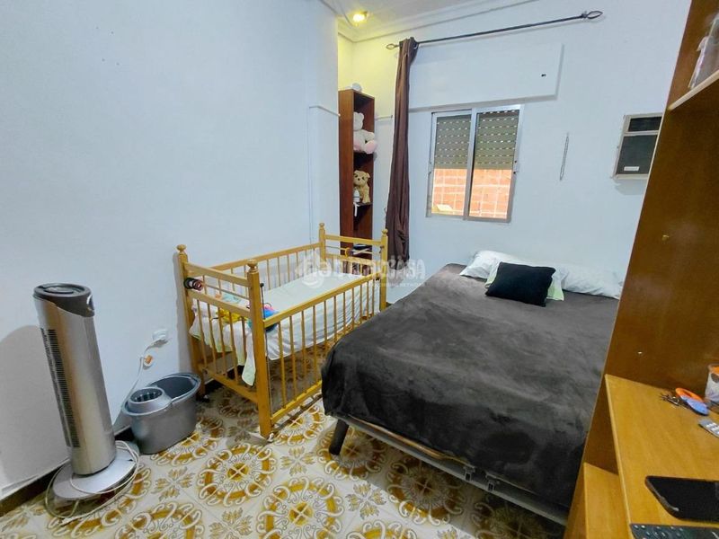 Foto 5f3a5ff7-b9d6-4d2c-801e-716a0268e39f. Casa aparellada a Palmete Sevilla