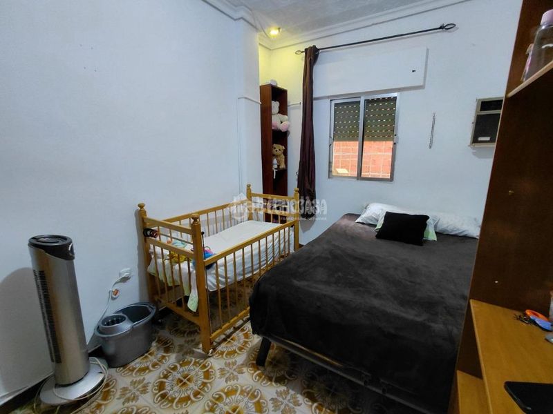 Foto b1d109ee-e0dc-43e7-b512-38795144d9c1. Casa aparellada a Palmete Sevilla