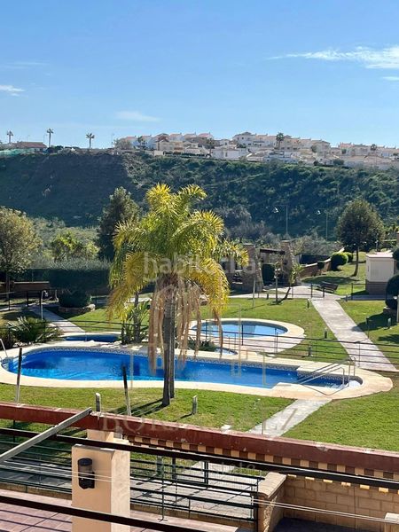Foto a42ccfda-bc44-4f9b-8221-bc43afc40424. Semi detached house with parking in Almayate Bajo