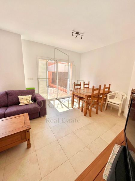 Foto cf5fede1-c7a5-4d66-832e-9a06761f4348. Casa adossada amb aparcament a Benajarafe